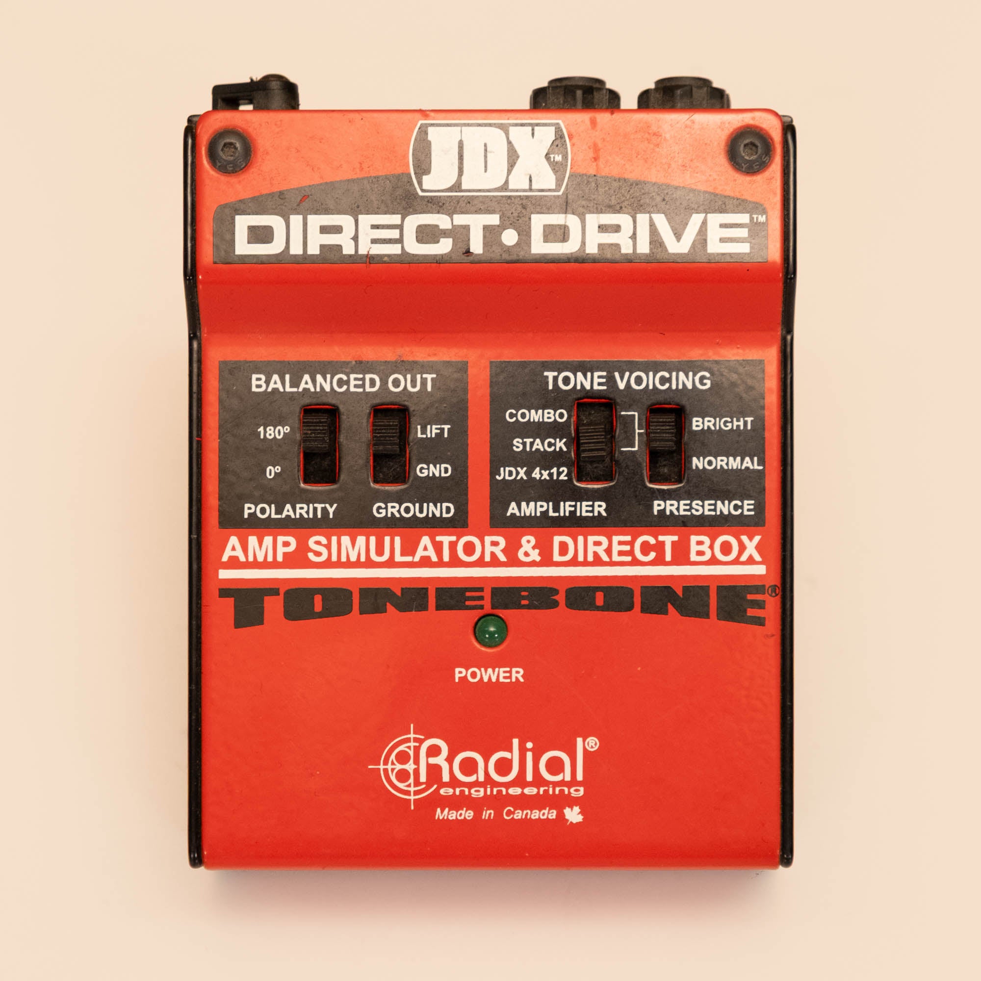 Radial Tonebone JDX direct-drive amp simulator and DI box guitar effects pedal by Radial Engineering, shown in the image.