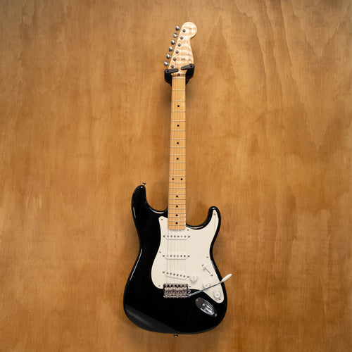 Fender Stratocaster Traditional II '50s electric guitar in black with maple neck, made in Japan, shown in close-up.