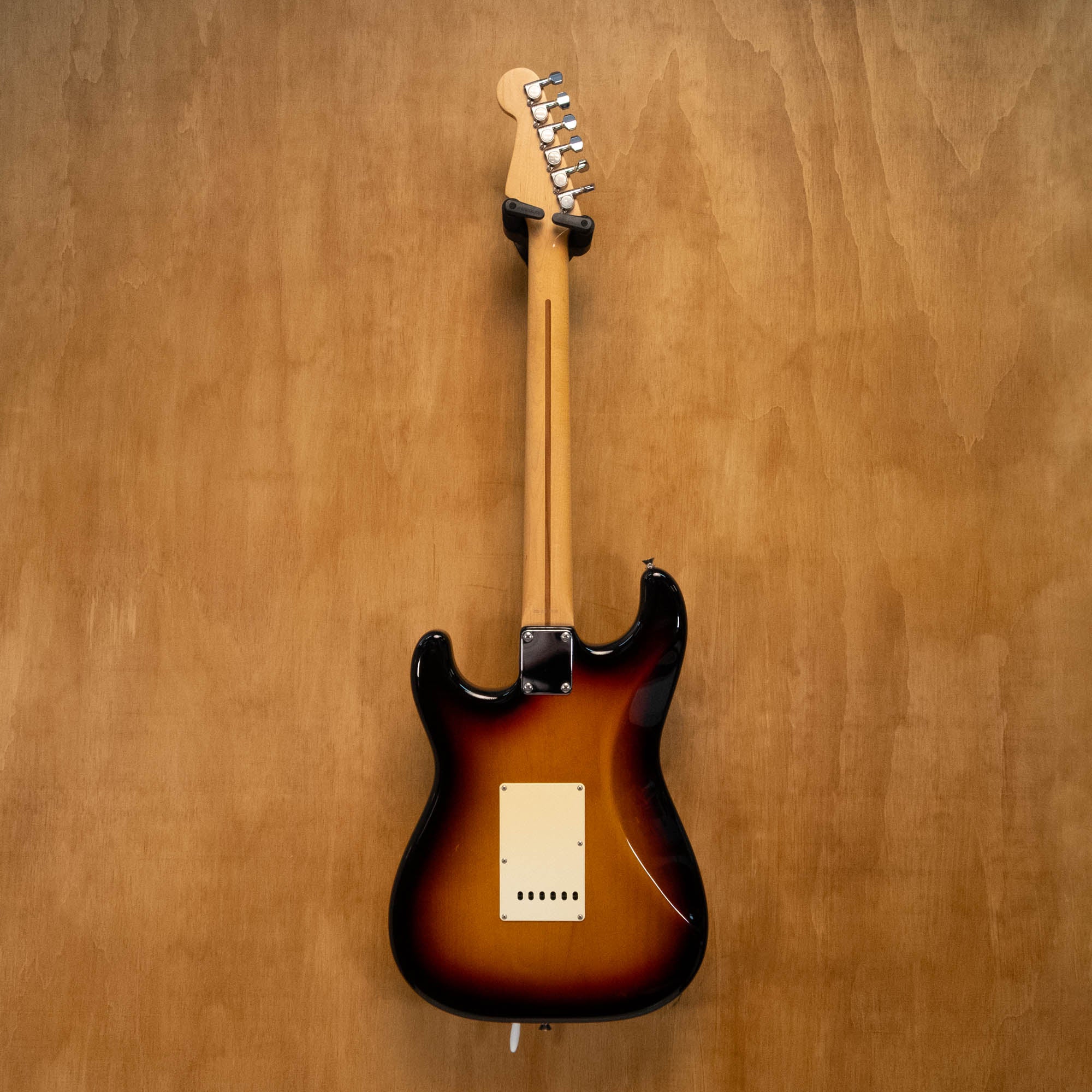 Fender Stratocaster ST-50 electric guitar in 3-tone sunburst finish, made in Japan, with a sleek body and vintage-style hardware.