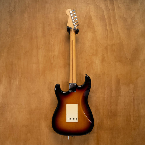 Fender Stratocaster ST-50 electric guitar in 3-tone sunburst finish, made in Japan, with a sleek body and vintage-style hardware.