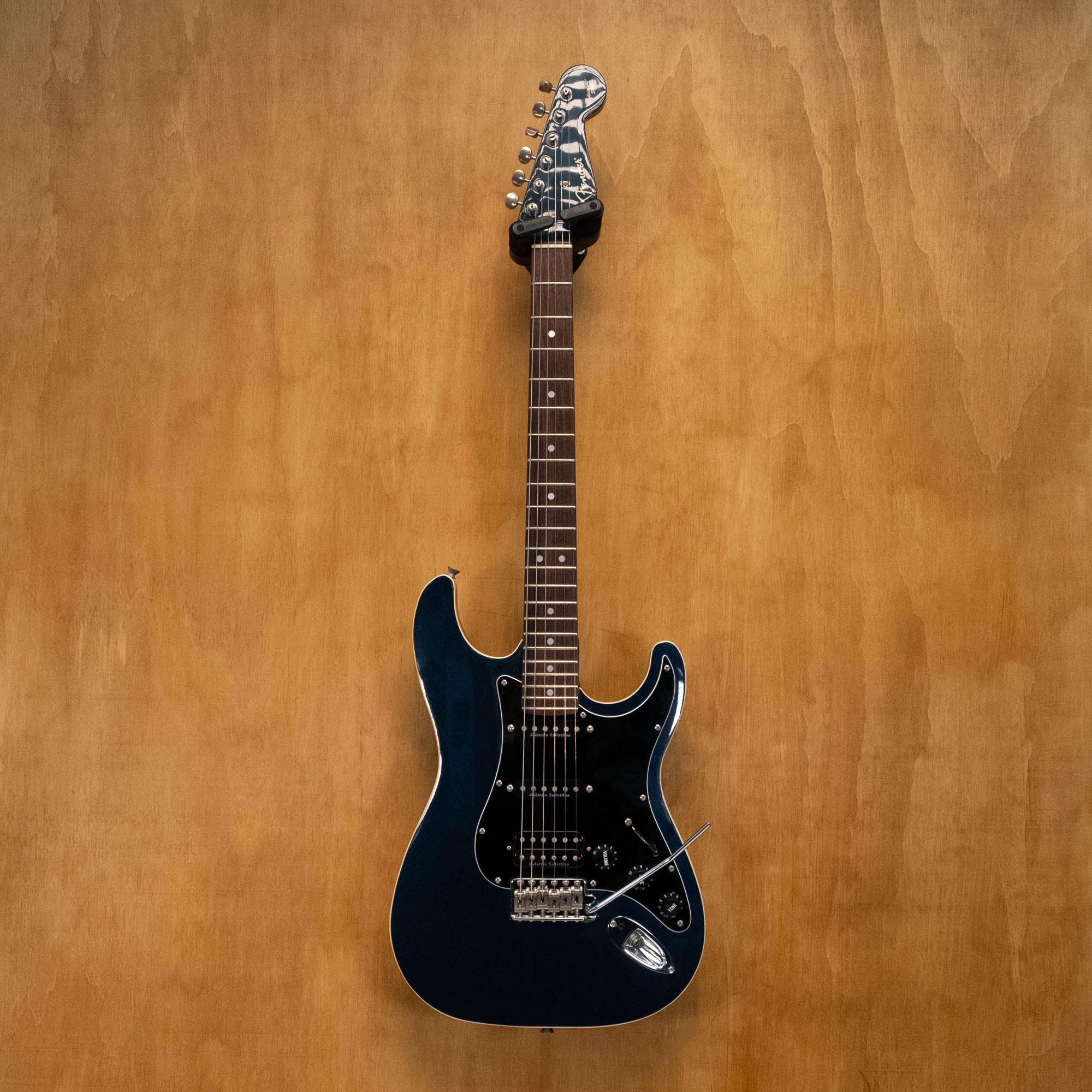 Fender Aerodyne Stratocaster electric guitar in gun metal blue with Dimarzio pickups, crafted in Japan, showing the body and neck.