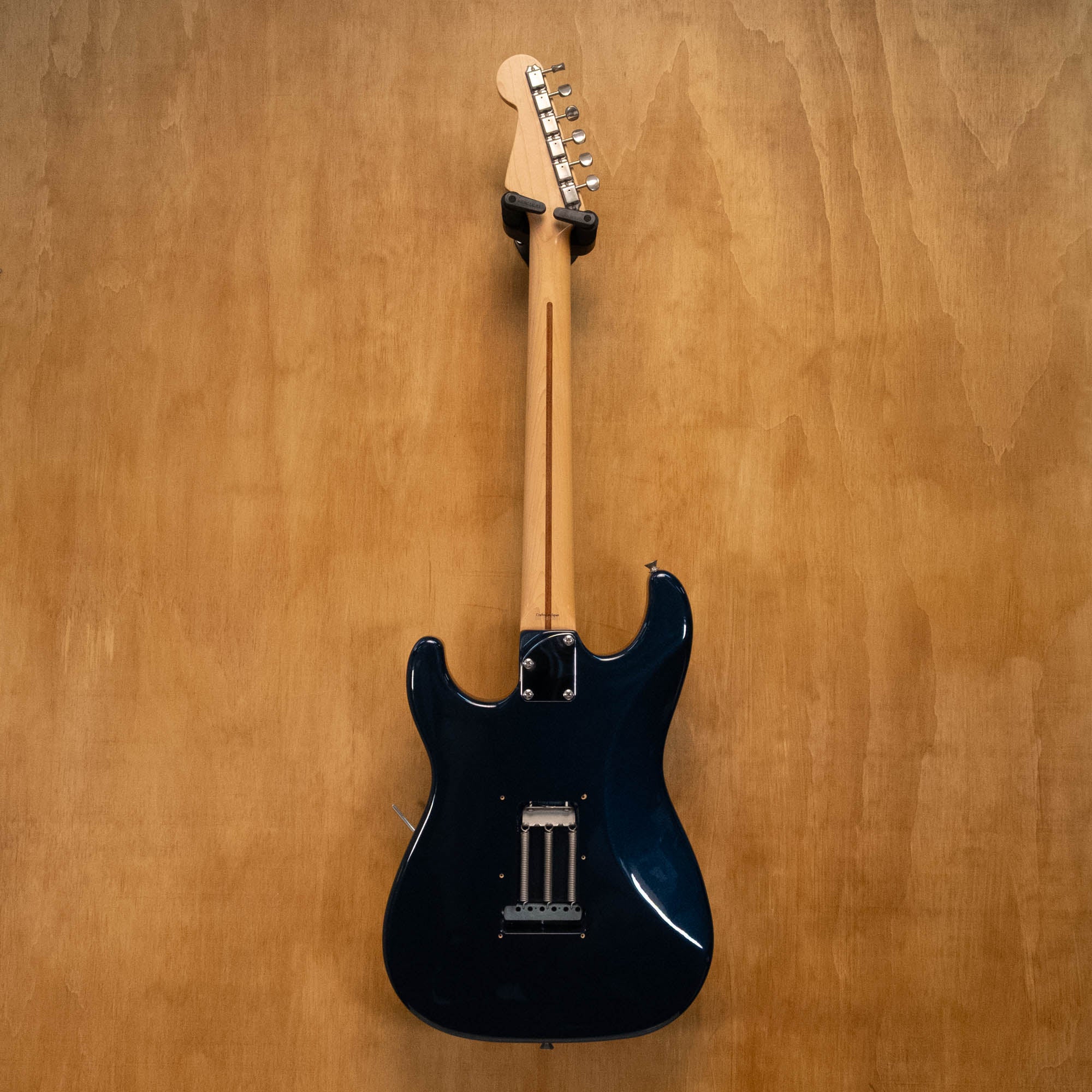 Fender Aerodyne Stratocaster electric guitar in gun metal blue with Dimarzio pickups, crafted in Japan, showing body and neck details.