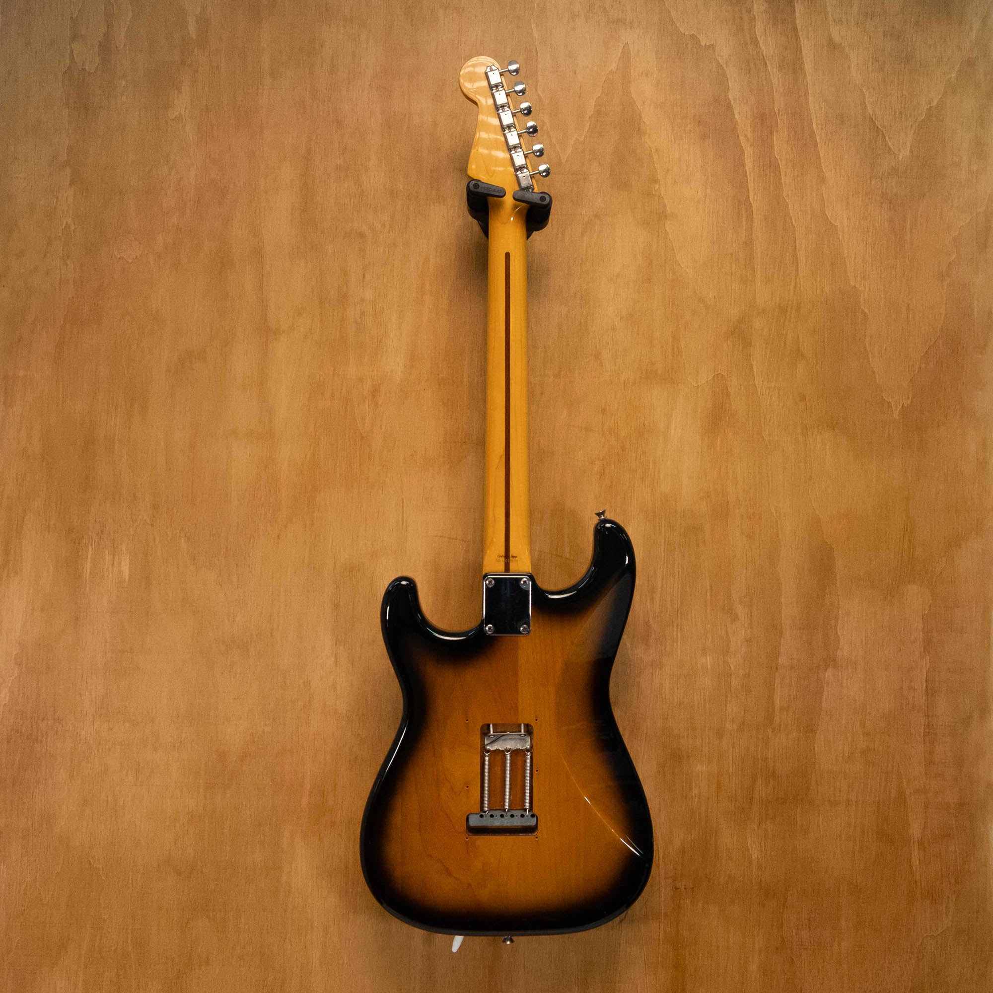 Fender '57 Stratocaster electric guitar in 2-tone sunburst with Texas Specials pickups, made in Japan, showing body and neck details