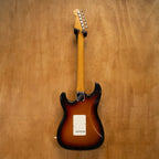 Fender '62 Stratocaster electric guitar in 3-tone Sunburst finish with maple neck and three pickups, made in Japan in the 1990s.