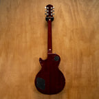 Epiphone Les Paul Standard Plus Top Pro electric guitar in Honey Burst finish, showing the body and neck detail.