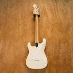 Fender '72 Stratocaster electric guitar with scalloped fingerboard in Olympic White, made in Japan, shown from the front.