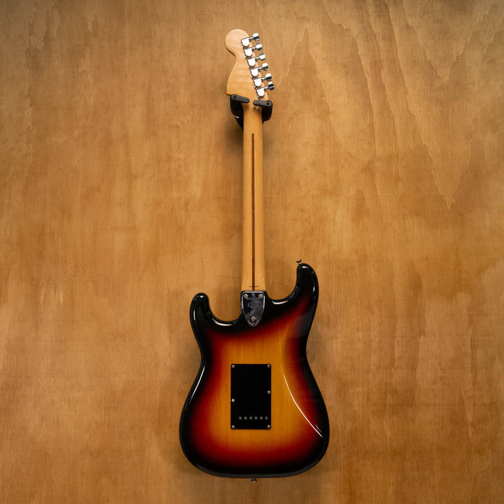 Fender '72 Stratocaster electric guitar in 3-tone sunburst finish, made in Japan, vintage style, with maple neck and three pickups.