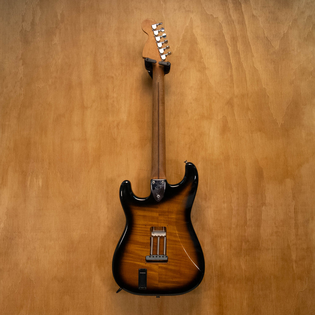 Fender '72 Stratocaster electric guitar in 2-tone sunburst with EMG pickups, made in Japan, vintage 1986, preowned.