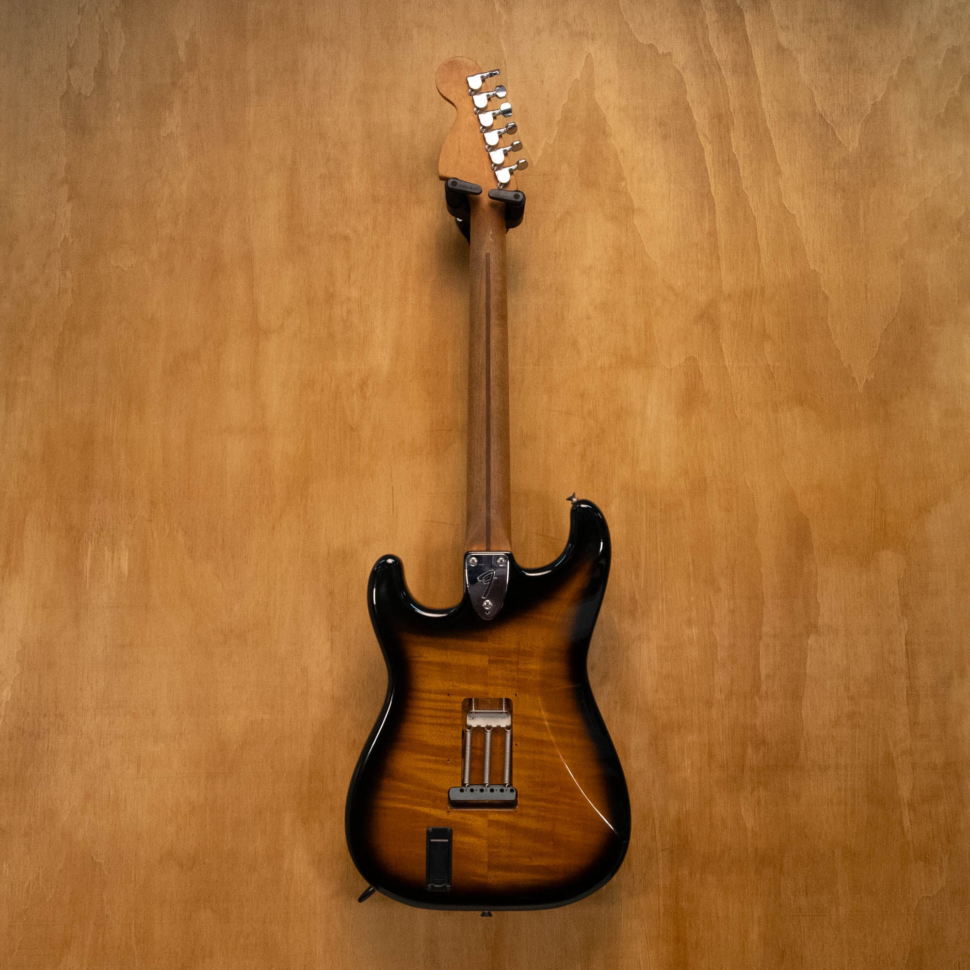 Fender '72 Stratocaster electric guitar in 2-tone sunburst with EMG pickups, made in Japan, vintage 1986, preowned.
