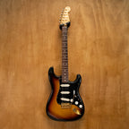 Fender '62 Stratocaster electric guitar in 3-tone sunburst with gold hardware, made in Japan, shown with body and neck details.