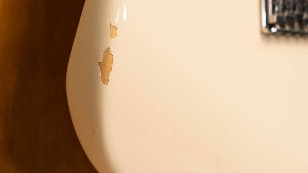 Fender '72 Stratocaster electric guitar with scalloped fingerboard in Olympic White, made in Japan, vintage-style guitar image.