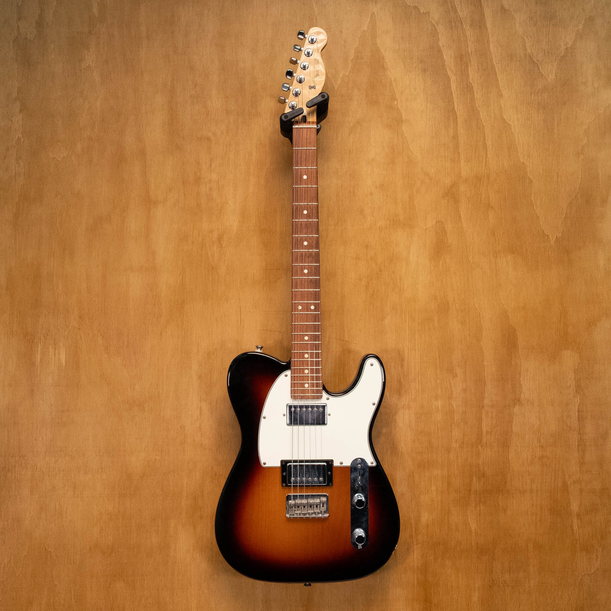 Fender Telecaster Player II HH electric guitar with black body and maple neck, shown in a close-up shot.