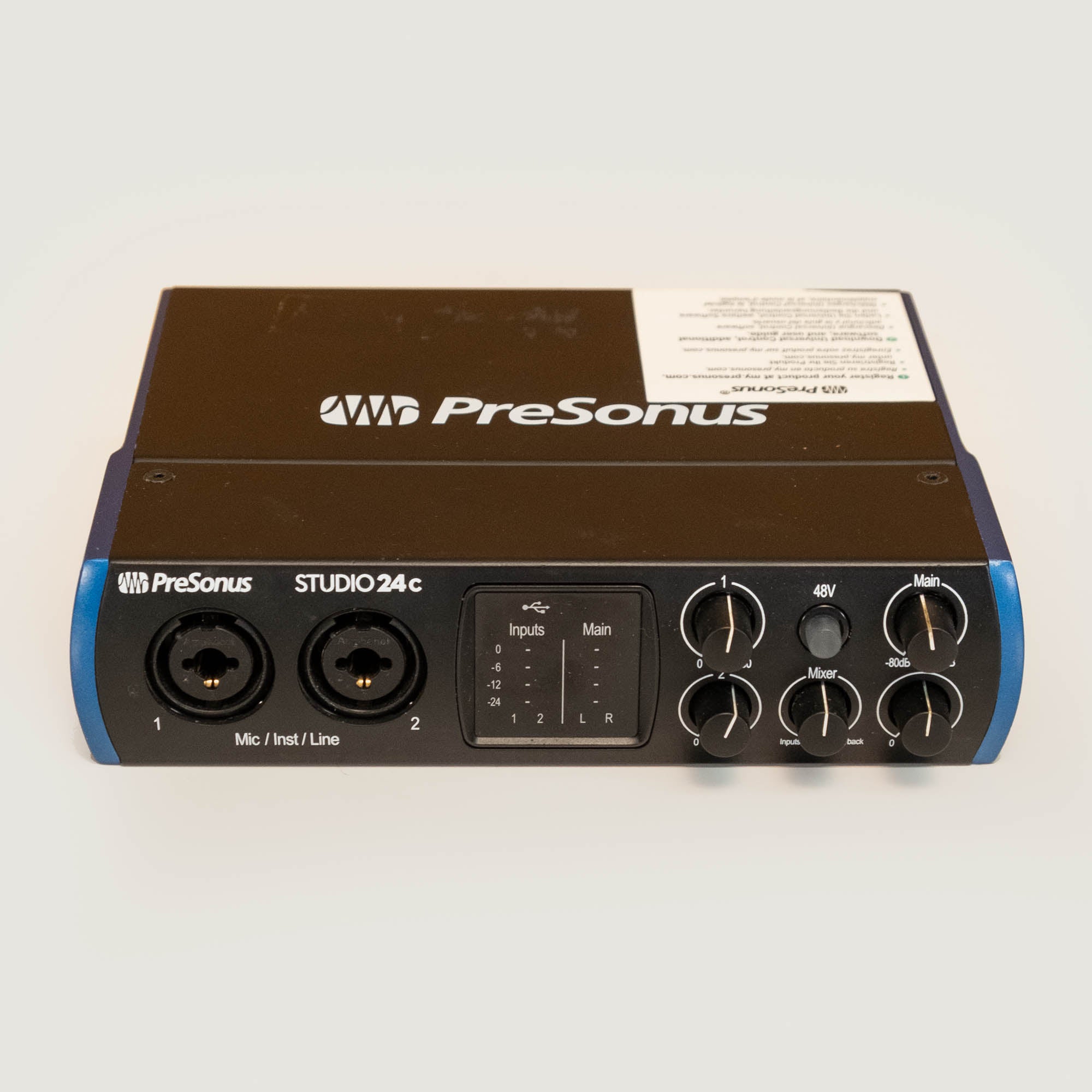 PreSonus Studio 24c audio interface with multiple input and output ports, compact design, and professional-grade audio quality.