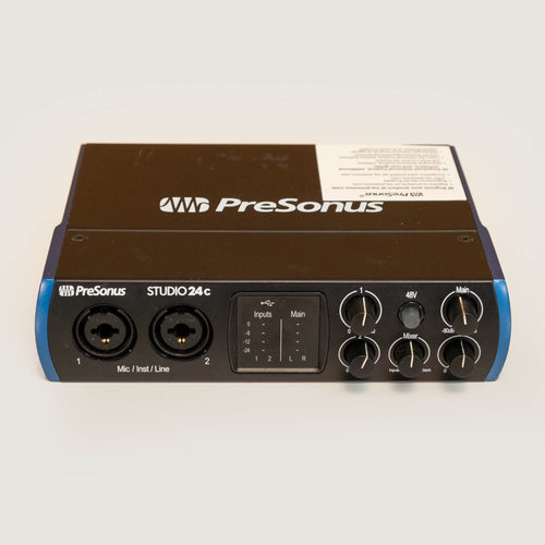 PreSonus Studio 24c audio interface with multiple input and output ports, compact design, and professional-grade audio quality.