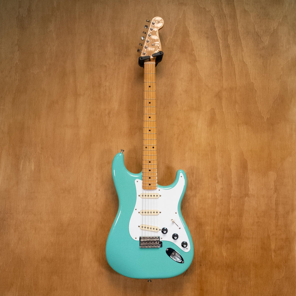 Fender Vintera '50s Stratocaster electric guitar in Sea Foam Green with maple neck and vintage-style pickups, shown from front angle.