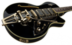 Black Duesenberg Starplayer TV Custom electric guitar with three pickups and chrome hardware, shown from a front angle.