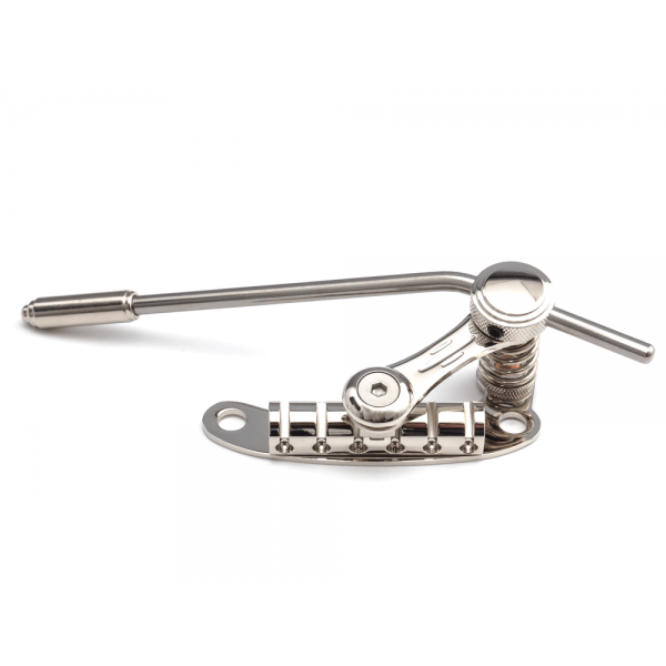 Duesenberg Les Trem II Nickel guitar tremolo bridge with chrome finish, mounted on a guitar body, showing detailed hardware and mounting screws.