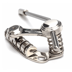 Duesenberg Les Trem II Nickel guitar tremolo bridge with six mounting screws and detailed nickel finish on a guitar.