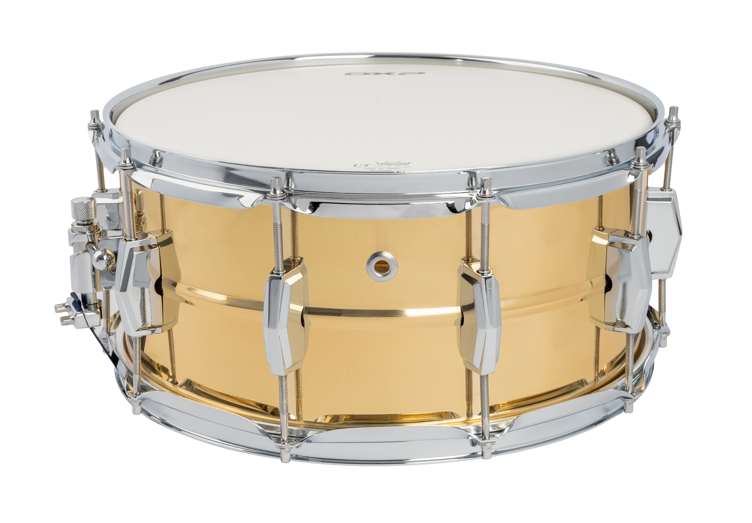 Close-up of DXP brass snare drum, showcasing its shiny metallic surface and drum hardware details.