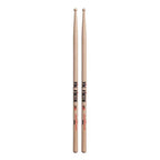 Vic Firth American Sound 5A wood tip drumsticks, lightweight sticks for drumming, showing their natural wood finish and tapered tips.