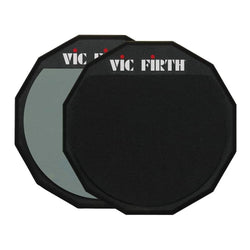 Vic Firth double-sided 12-inch drum practice pad with textured surfaces for practicing drum techniques and rhythm.