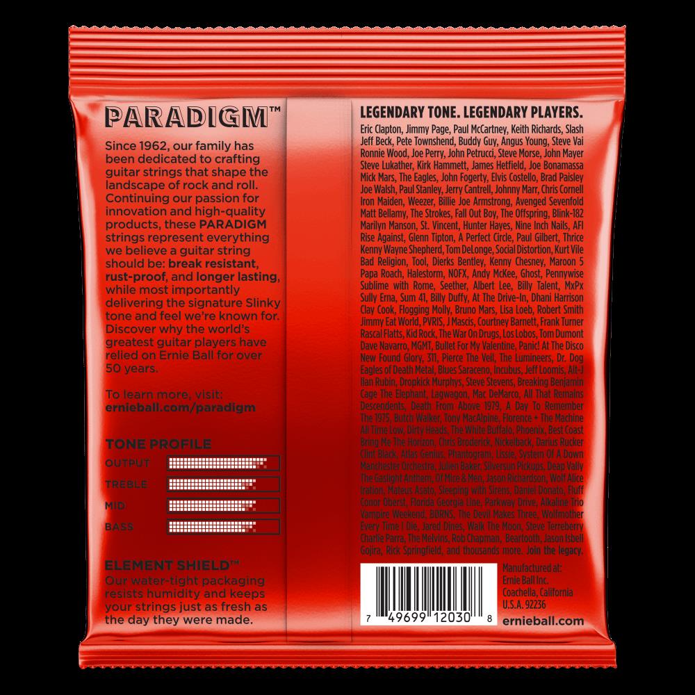 Ernie Ball Paradigm Slinky 7-string electric guitar strings in 10-62 gauge, shown on a guitar with black and silver packaging.