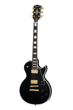 Black Epiphone Inspired By Gibson Les Paul Custom electric guitar with gold hardware and carved top, full view from the front.