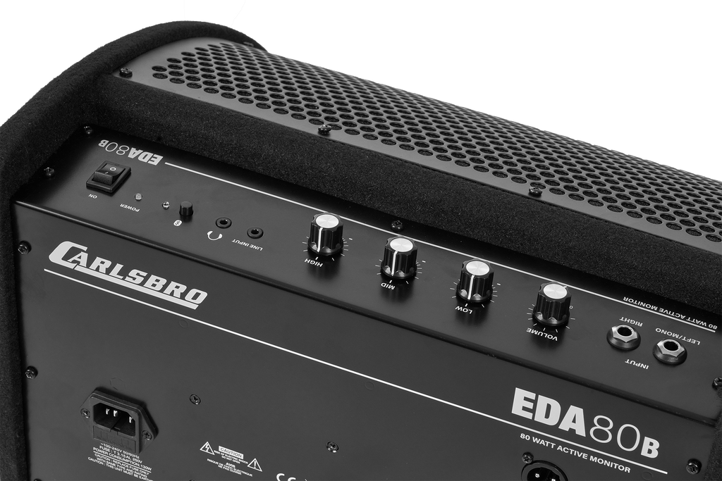 Carlsbro Drum Monitor amplifier with blue tooth connectivity, featuring control panel and audio input options for drummers.