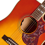 Epiphone Hummingbird Standard EC acoustic guitar in cherry sunburst finish, showcasing its body, soundhole, and vintage style.