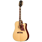 Acoustic guitar by Epiphone Hummingbird Standard EC in natural finish, featuring a traditional dreadnought shape and decorative pickguard.