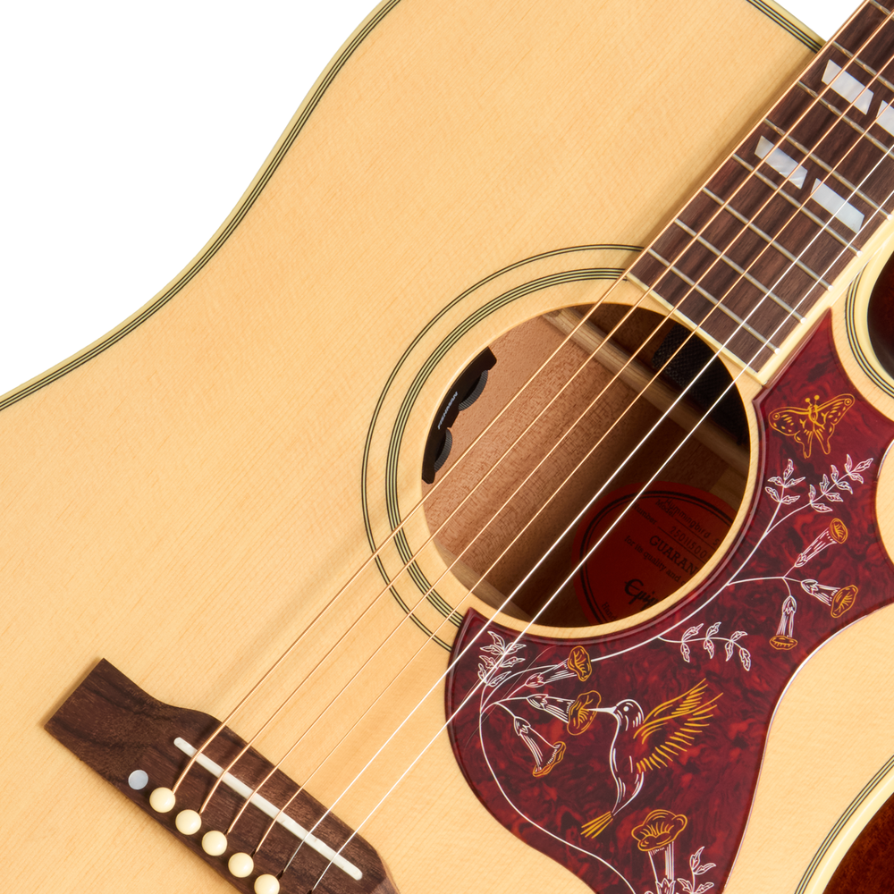 Acoustic guitar Epiphone Hummingbird Standard EC in natural finish, featuring a classic shape and detailed pickguard, front view.