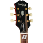 Epiphone Hummingbird Standard acoustic guitar in cherry sunburst finish, left-handed, showcasing the body and detailed design.