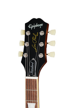 Electric guitar Epiphone Les Paul Standard '50s in Inverness Green with a black finish and chrome hardware, shown with a gig bag.