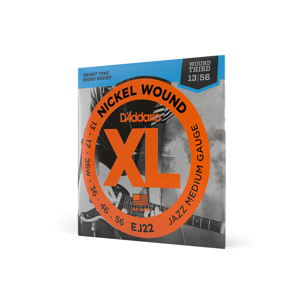 D'Addario EJ22 13-56 Jazz Medium electric guitar strings in XL Nickel, arranged on a guitar neck for jazz playing style.
