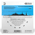 D'Addario EJ83L Gypsy Jazz acoustic guitar strings in 10-44 gauge, shown on a guitar with packaging in the background.