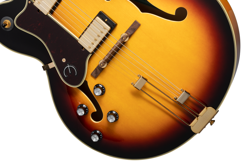 Left-handed Epiphone Broadway electric guitar in vintage sunburst finish with a classic archtop design.