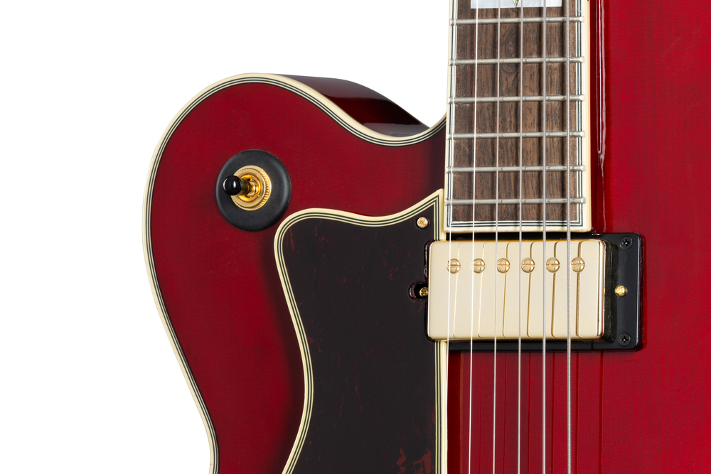 Left-handed Epiphone Broadway electric guitar in wine red with a glossy finish, featuring a classic design and dual pickups.