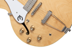 Left-handed Epiphone Casino electric guitar in natural finish, showing the body, pickups, and neck with detailed wood grain.