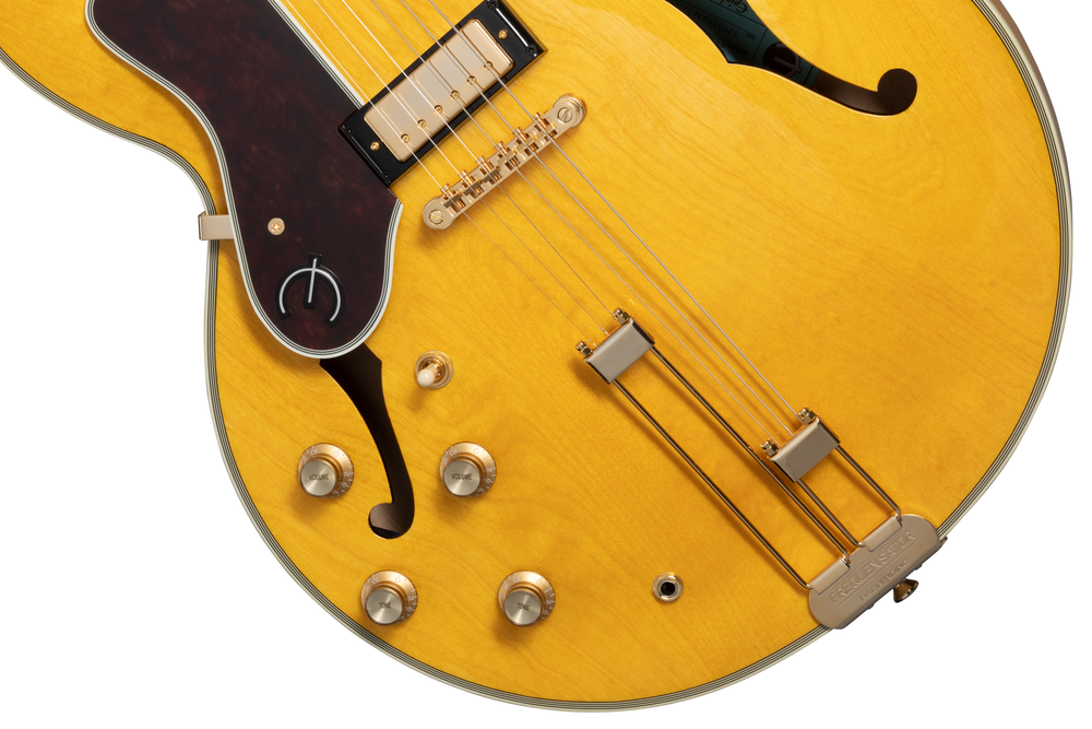 Left-handed Epiphone Sheraton Frequensator electric guitar in natural finish, featuring dual humbuckers and classic design details.