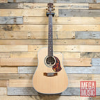Maton ER90c acoustic guitar with a polished wood finish and six strings, shown from a side angle.