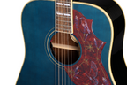 Epiphone Miranda Lambert Bluebird acoustic guitar in blue with matching case, featuring a natural wood finish and detailed fretboard.
