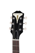 Black Epiphone USA Coronet electric guitar with sleek body and chrome hardware, showcasing its classic design and ebony finish.