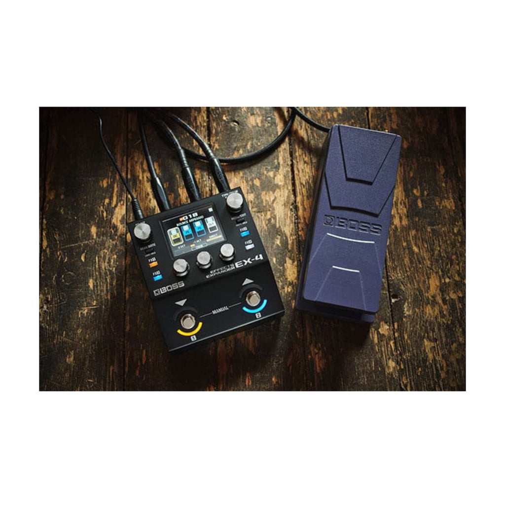 BOSS EX4 Effects Expander Pedal, a compact guitar effects pedal with multiple effects and control knobs, on a pedalboard.