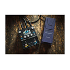 BOSS EX4 Effects Expander Pedal, a compact guitar effects pedal with multiple effects and control knobs, on a pedalboard.
