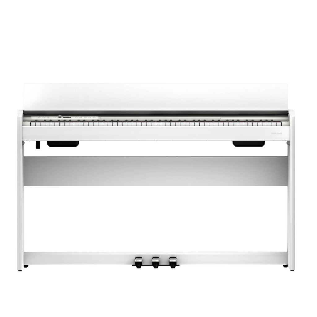 White Roland F-701 digital piano with sleek design and control panel, perfect for home music practice and performance.