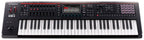 Roland FANTOM-06 workstation synthesizer with a sleek black design, multiple control knobs, and a digital display screen.