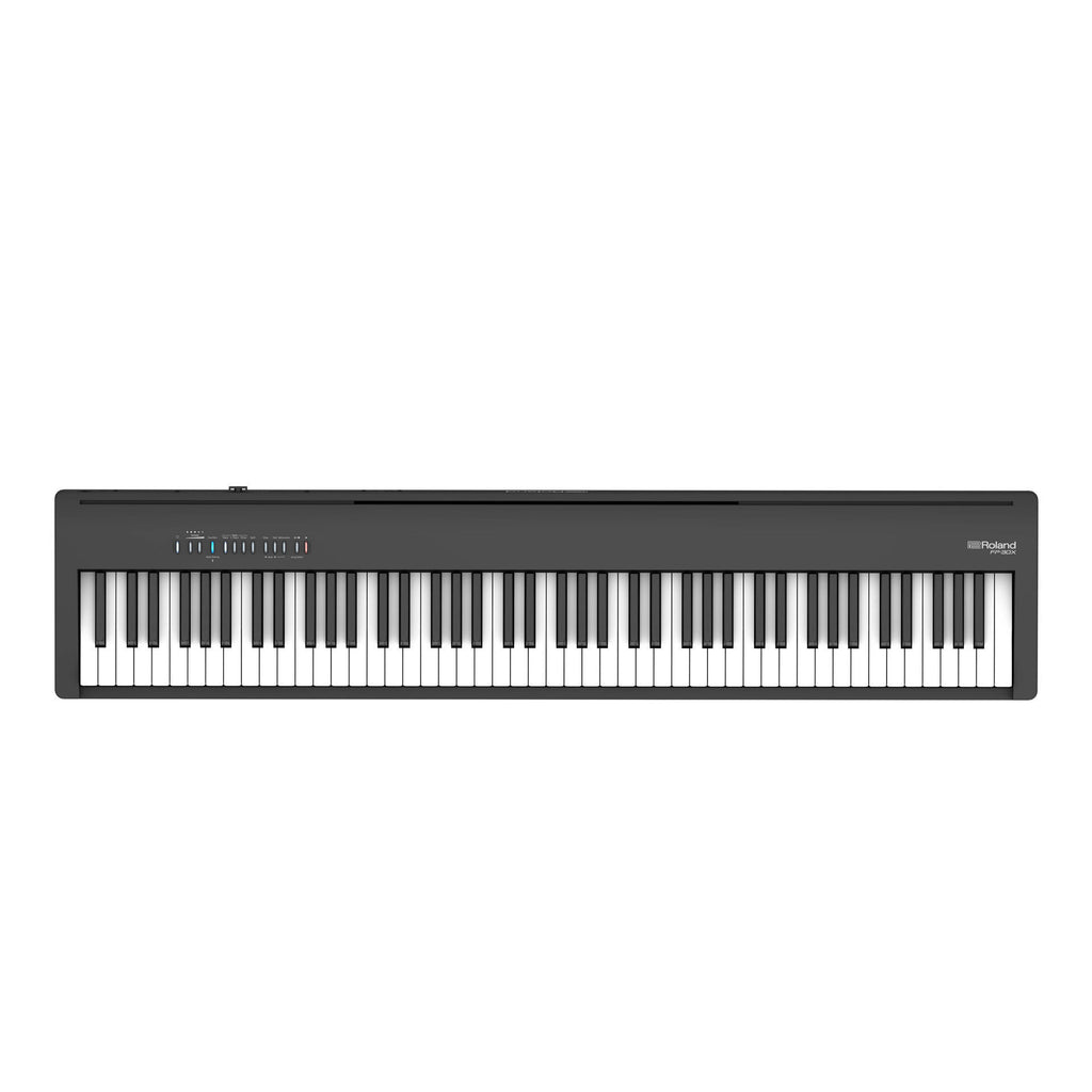 Roland FP-30X portable digital piano in black, showing the sleek keyboard with control panel and compact design.