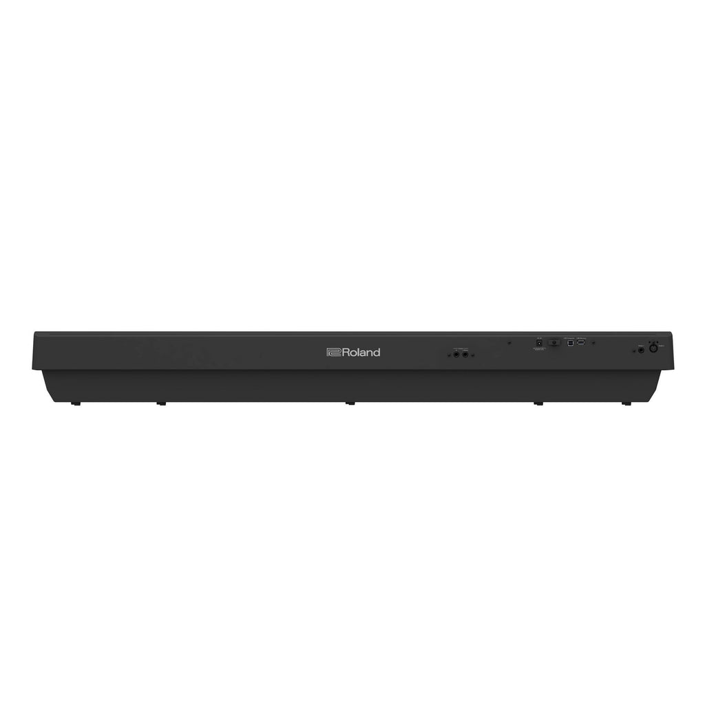 Roland FP-30X portable digital piano in black with stand and accessories, ideal for home practice and performances.