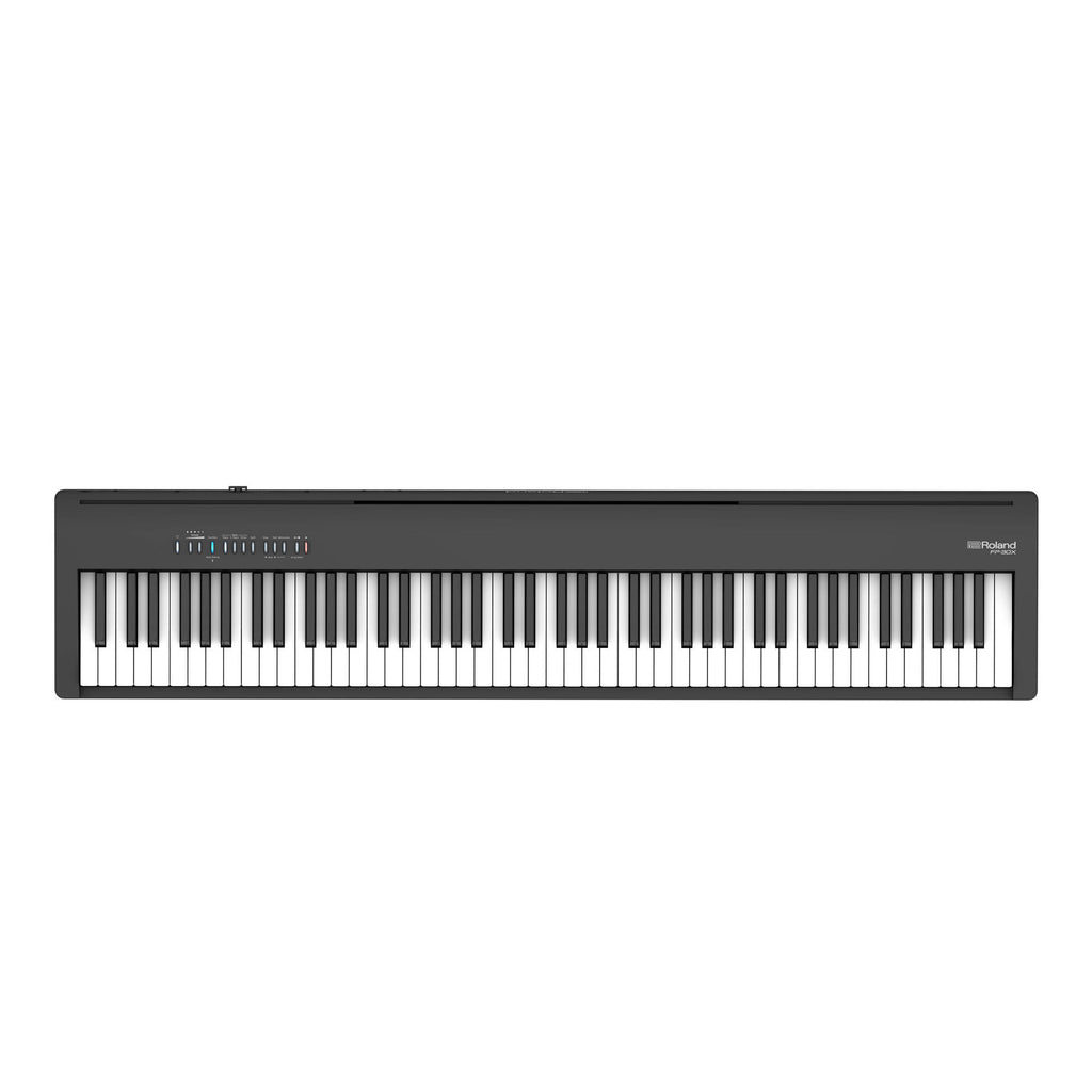 Roland FP-30X 88-key digital piano in black, portable electronic keyboard with sleek design and full-sized keys.