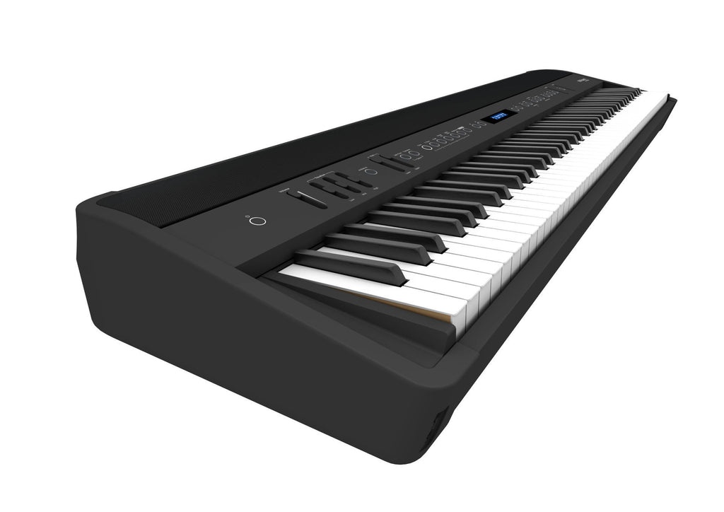 Roland FP-90X portable digital piano in black, showcasing the sleek keyboard and control panel.